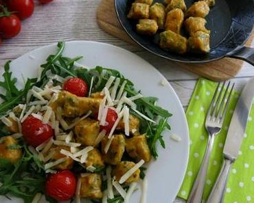Süßkartoffel-Gnocchi mit Rucola und Ofentomaten