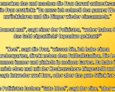 Eine Frau fährt mit dem Fahrrad durch die...