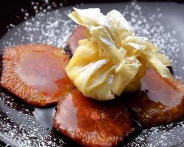 Vanillecremepäckchen auf Gewürzorangen