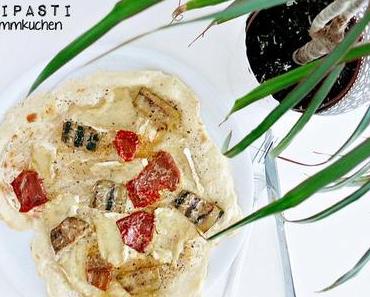 Antipasti-Flammkuchen mit zweierlei Käse